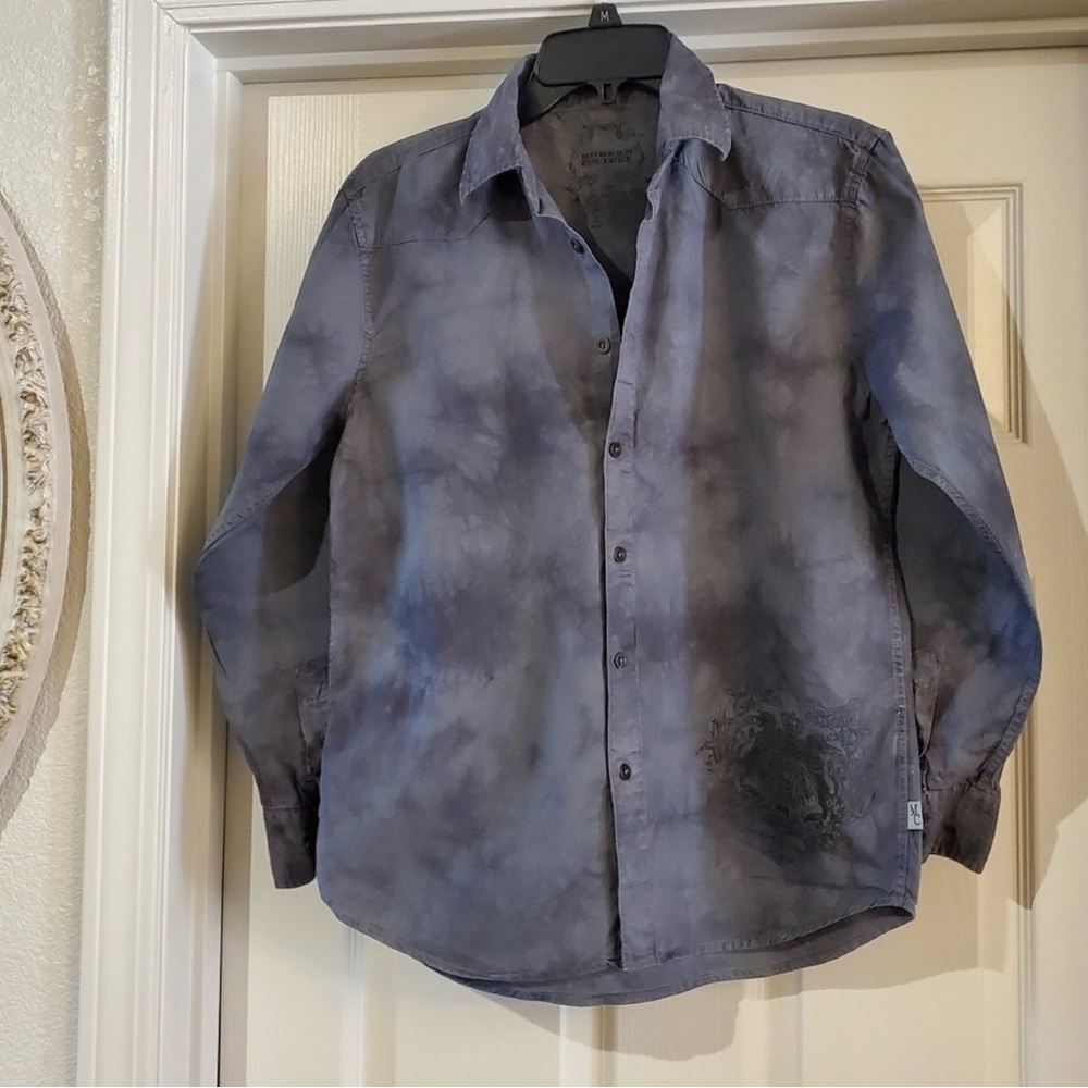 Modern Culture long sleeve botton up shirt is a size Large.